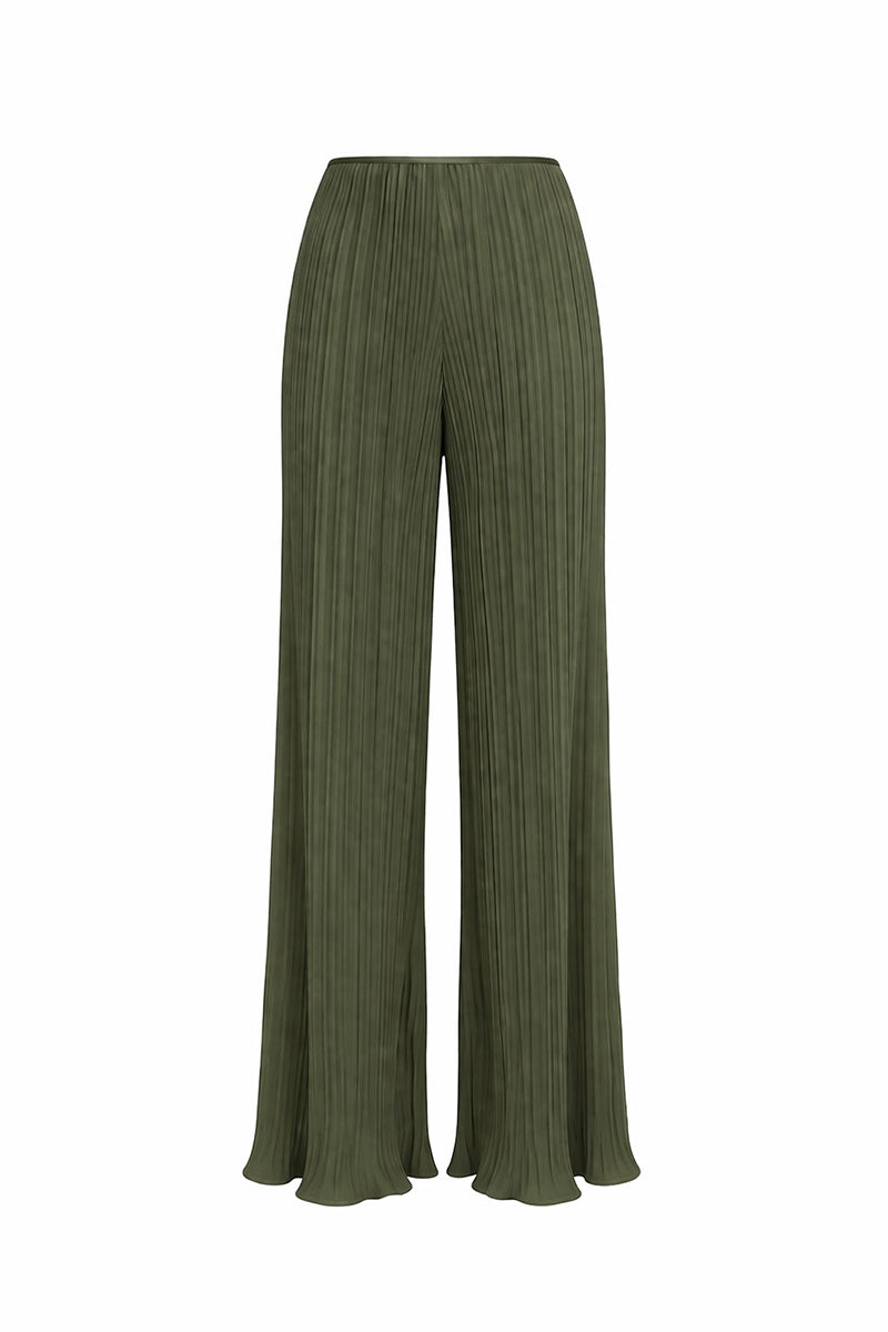 Forest green Choza Plisse Pants by Maylé Vásquez, showing the lightweight, pleated fabric and relaxed fit.