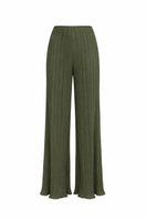Forest green Choza Plisse Pants by Maylé Vásquez, featuring pleated fabric and a relaxed fit, displayed on a model.