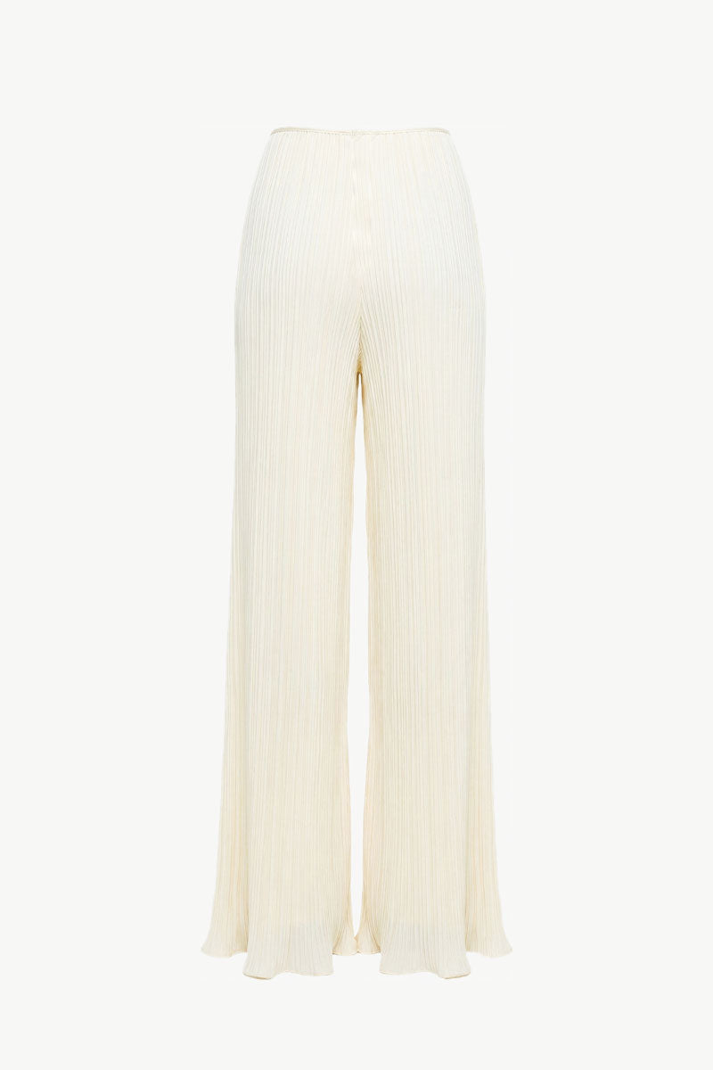 Off-white Choza Plisse Pants by Maylé Vásquez, featuring lightweight pleated fabric and relaxed fit for casual wear.