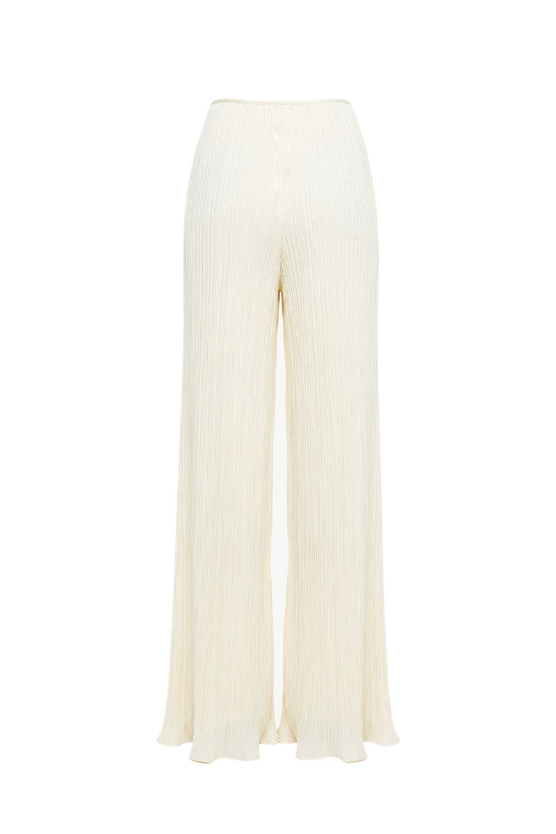 Off-white Choza wide leg pants by Maylé Vásquez, featuring relaxed fit and flowing fabric, displayed on a neutral background.