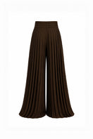 Maylé Vásquez CIBAENO pants in neutral fabric with a relaxed fit, shown in a close-up front view.