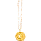 Gold cinnamon roll-shaped pendant necklace by Oz Objects, featuring a detailed and stylish design.