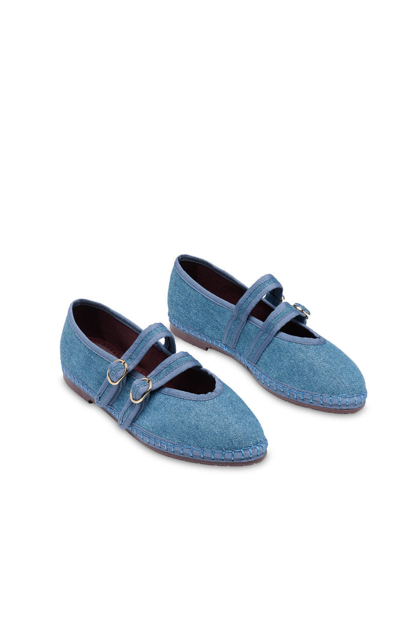 Blue Claire denim flats by Flabelus with a rounded toe and casual slip-on design, perfect for everyday wear.