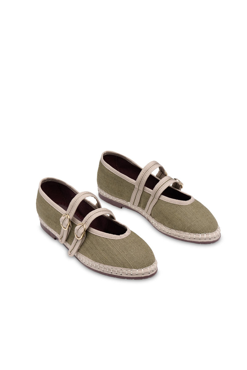 Flabelus Claire green flats with pointed toes and sleek design, displayed on a neutral background.