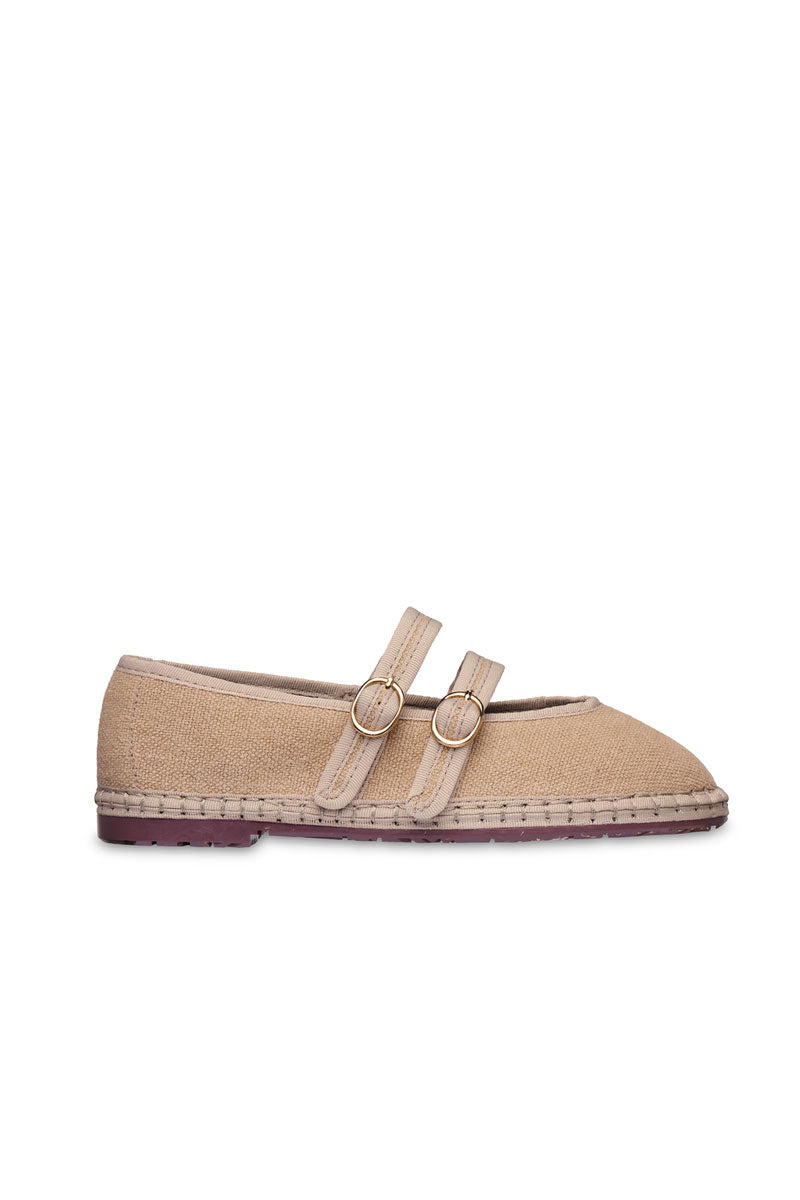 Flabelus Claire Sand Flats featuring tan slip-on design with a rounded toe and comfortable flat sole, perfect for casual wear.