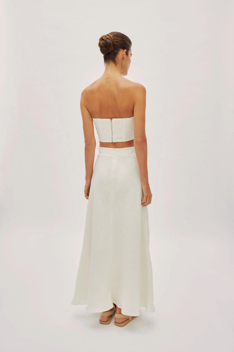 Ecru linen Clara maxi skirt by Labeca featuring a flowy design and bandeau waist, perfect for casual or dressy summer looks.