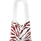 Brown and white zebra print shoulder bag by SAC DE SOUL with a stylish, spacious design and adjustable strap.