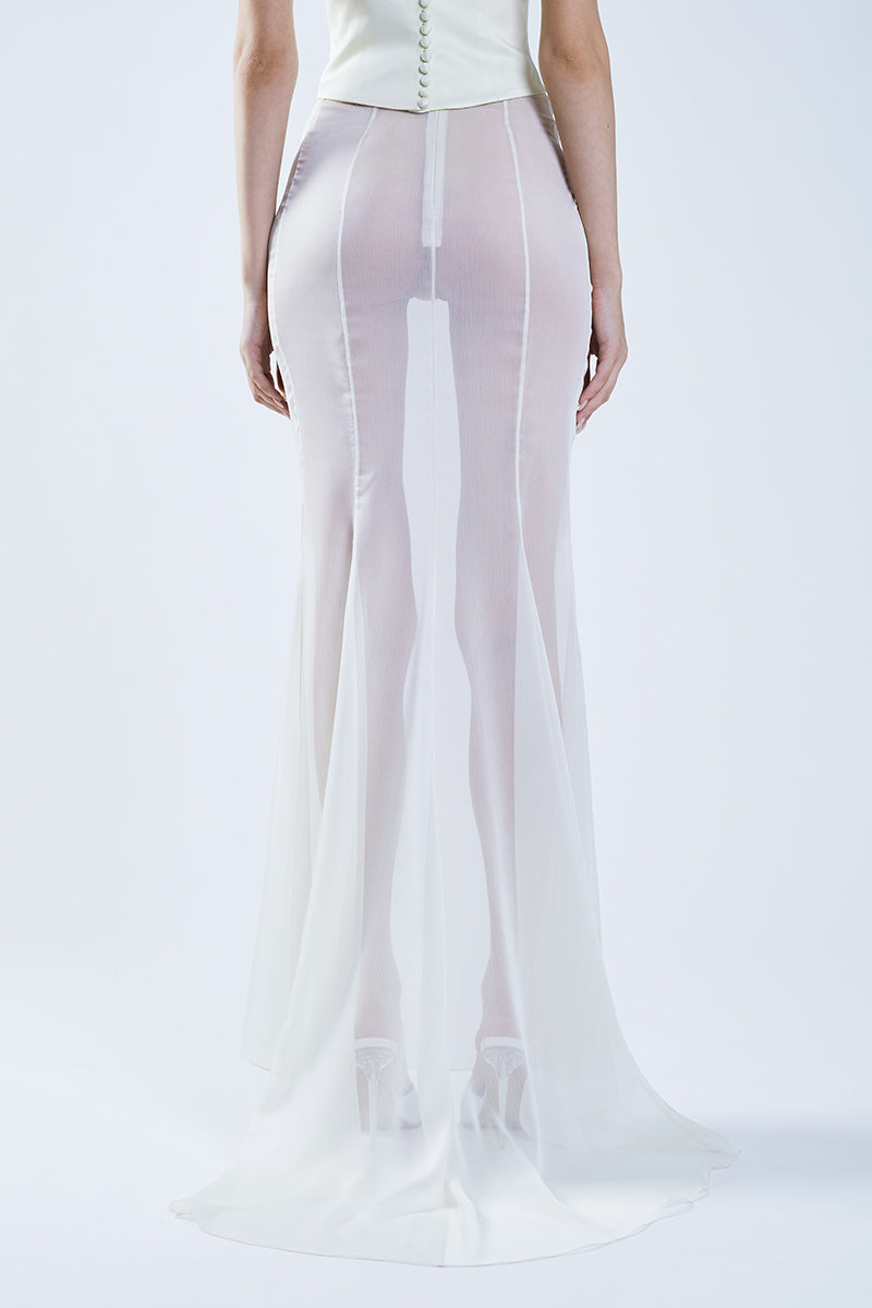 Beige fishtail maxi skirt from Stolen Stores with a classic silhouette and flowing design, styled with a beige bustier top.