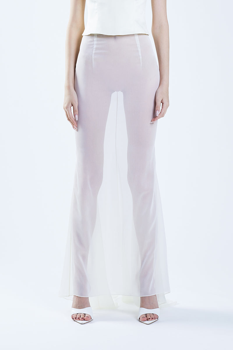 Beige fishtail maxi skirt from Stolen Stores with a classic design, shown styled with a beige bustier top.