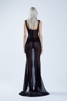 Black fishtail maxi skirt by Stolen Stores, flowing design with a fitted waist and elegant silhouette.