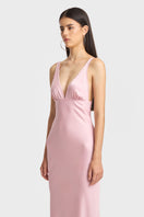 Pink classic maxi slip dress by Stolen Stores, featuring a flowy silhouette and lightweight fabric for a stylish, elegant look.