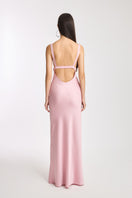 Pink classic maxi slip dress by Stolen Stores featuring a flowing fabric and elegant design, perfect for casual or formal wear.