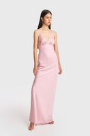 Pink classic maxi slip dress by Stolen Stores, featuring a flowing silhouette and elegant design.