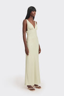 Light green Stolen Stores CULT MIA X Stolen Stores classic maxi slip dress displayed on a hanger.