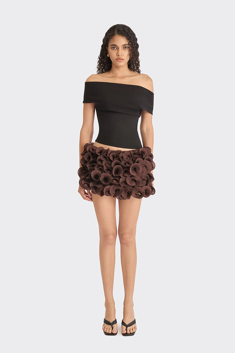 Black off-shoulder top from Stolen Stores featuring a classic, stylish design and fitted silhouette.