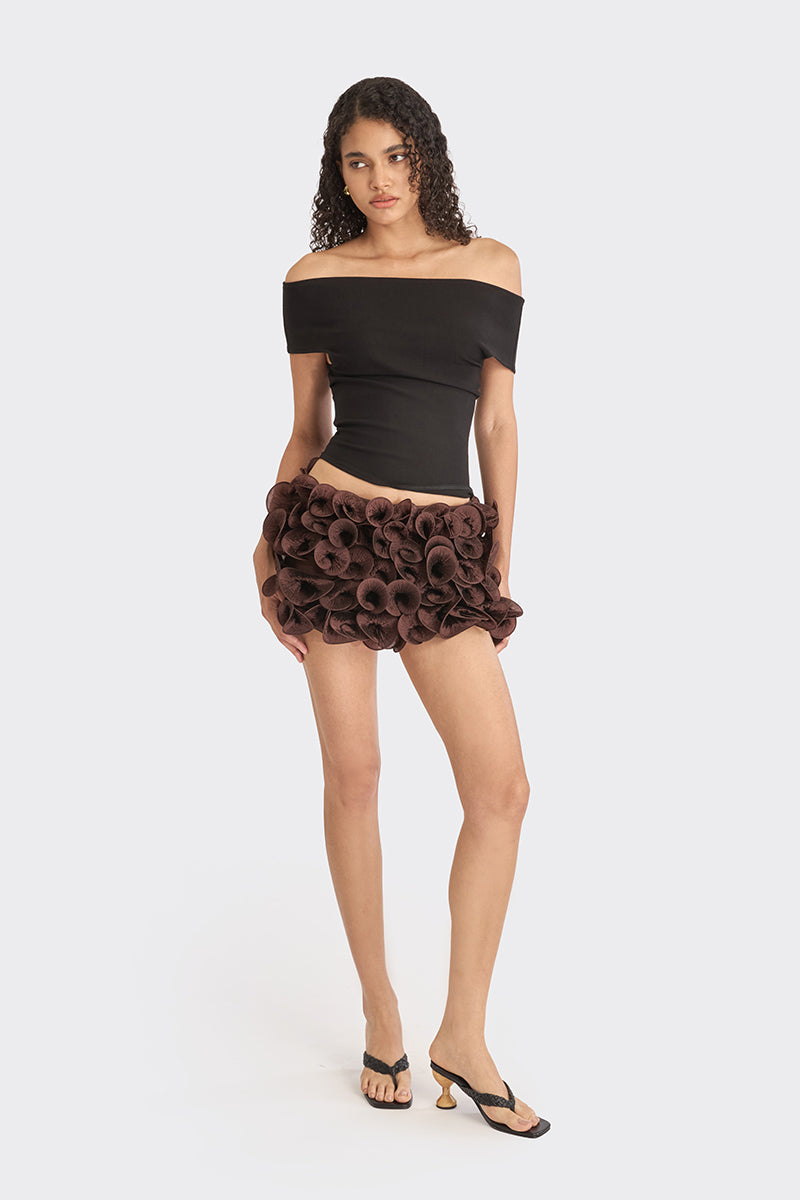 Black classic off-shoulder top by Stolen Stores, featuring a stylish neckline and relaxed fit, perfect for casual or chic outfits.