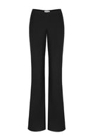 Black low waist pants from Stolen Stores featuring a classic fit and smooth fabric, displayed on a neutral background.