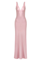 Pink classic maxi slip dress from Stolen Stores featuring a flowing silhouette and adjustable spaghetti straps.