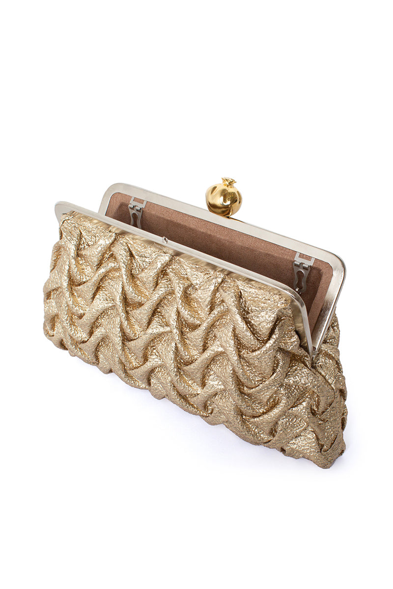 Sarah's Bag pomegranate smocking clutch with gold accents, open side view showcasing elegant design and craftsmanship.