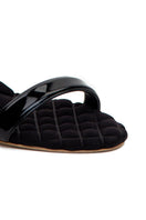 AERA Claudia black patent-effect slingback sandals with pointed toes and sleek design, front view showing shiny finish and elegant style.