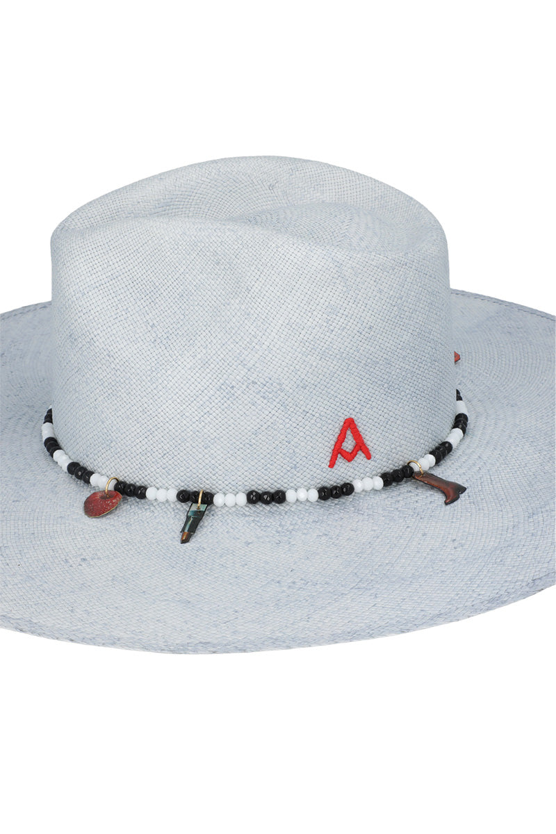 Ser Clues of the Sky hat featuring a wide brim and sky-themed design, perfect for sun protection and stylish outdoor wear.