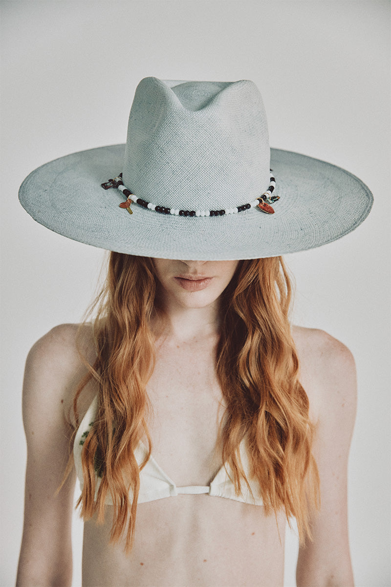SER Clues of the Sky hat, stylish wide-brim hat with sky-themed pattern, perfect for sun protection and fashionable outdoor wear.