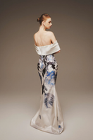 Elegant cobalt blue strapless gown by Margée Atelier featuring a flowing silhouette and floral-inspired design.