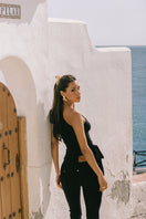Nana Jacqueline Margaux black jeans, slim fit denim with classic five-pocket design, shown worn on a model in a casual setting.