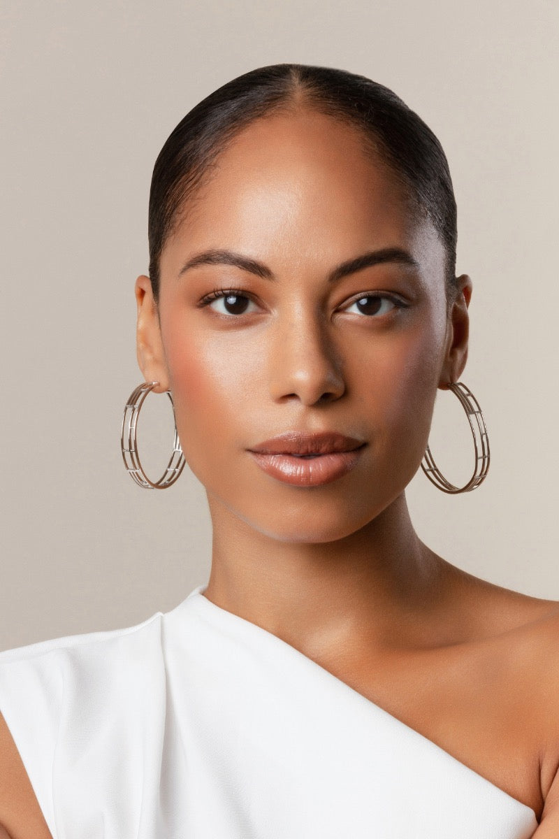 Silver maxi earrings by Sara Shala featuring bold, intricate design with ornate detailing and a polished finish.