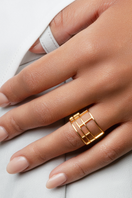 Close-up of Sara Shala Colosseo ring in yellow gold vermeil showcasing its intricate design and polished finish.