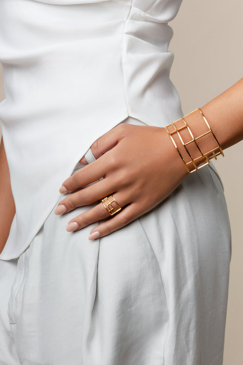Sara Shala Colosseo ring in yellow gold vermeil, showcasing a sleek and elegant ring design with a polished finish.