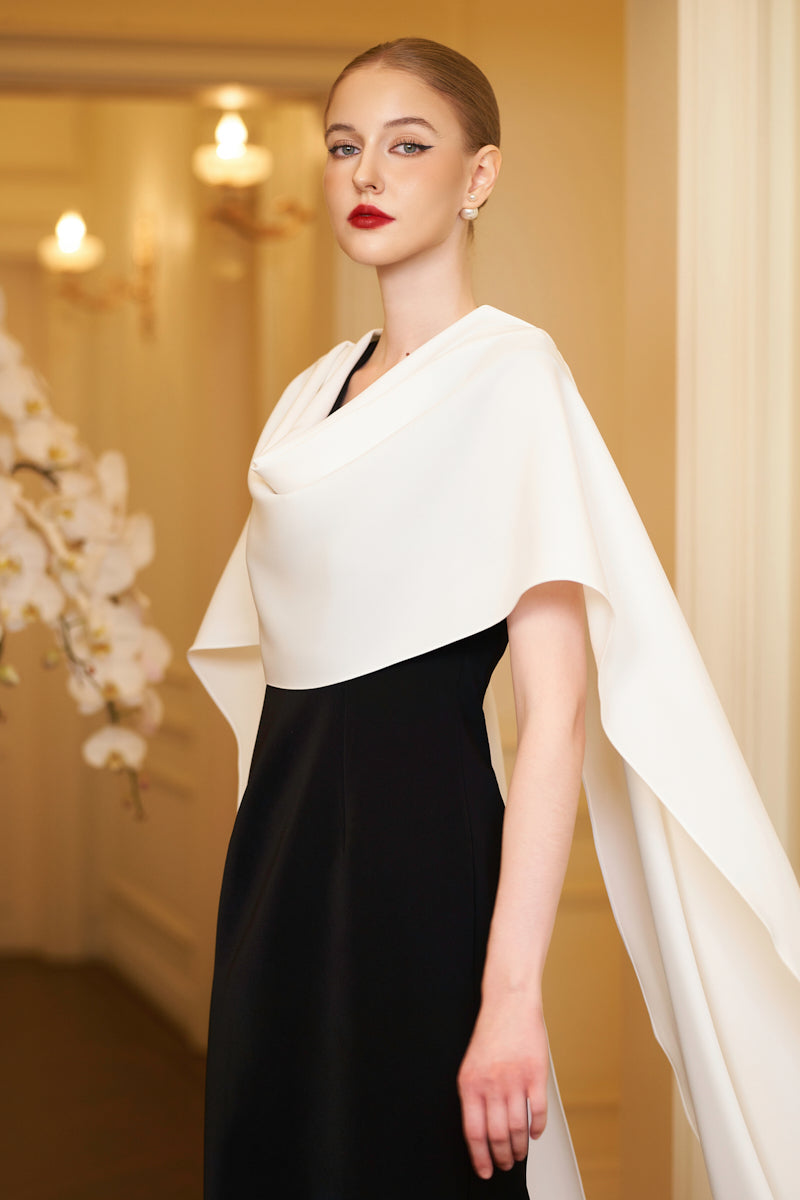 White draped shoulder evening gown by I.H.F featuring elegant ribbon detail and a sleek column silhouette.