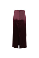 Purple YASSMIN SALEH midi column skirt with a sleek fit and ghost back design, perfect for stylish and elegant outfits.