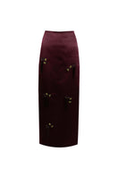 Purple YASSMIN SALEH midi column skirt with a sleek, fitted design, shown from the front in a stylish silhouette.