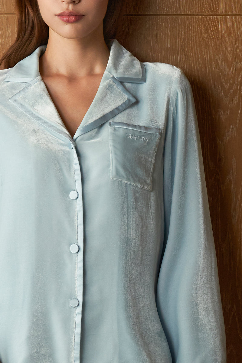 Blue velvet women's pajama set by MANITO, featuring a cozy, stylish top and pants for comfortable sleepwear.