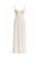Off-white Concha dress by Maylé Vásquez, elegant gown with flowing fabric and refined design, perfect for formal occasions.