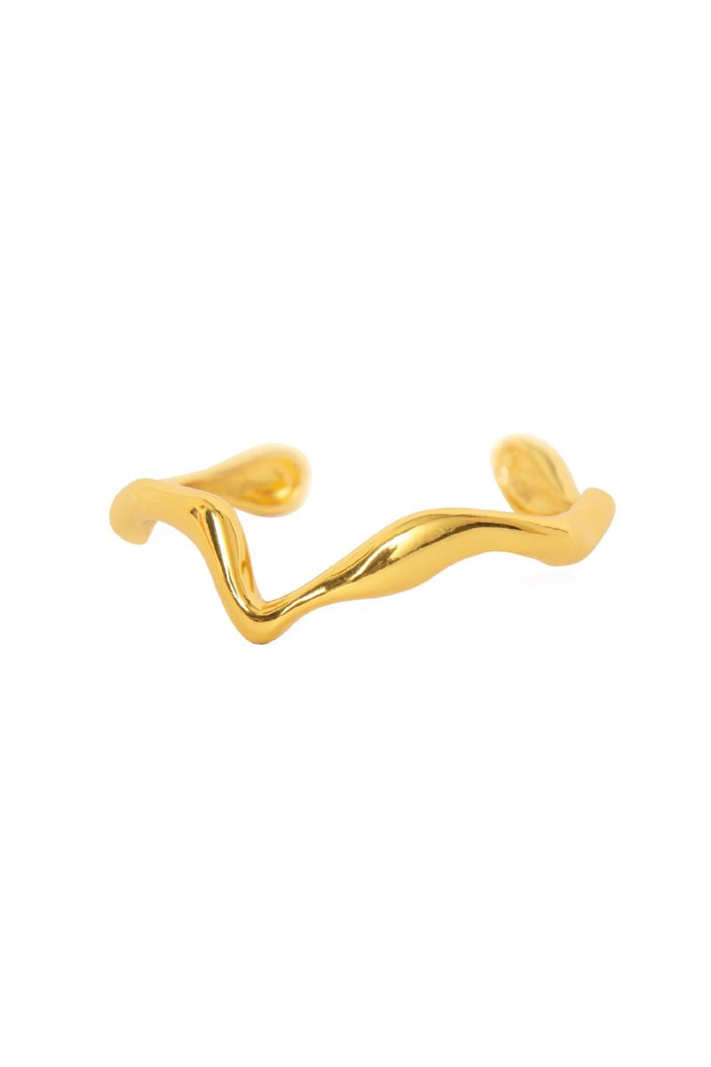 Gold Consciencia bracelet by Eugenia Ospina featuring delicate chain links and a minimalist design.