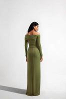 Deme By Gabriella Connie olive off-the-shoulder draped maxi dress displayed on a hanger with flowing fabric and elegant design.