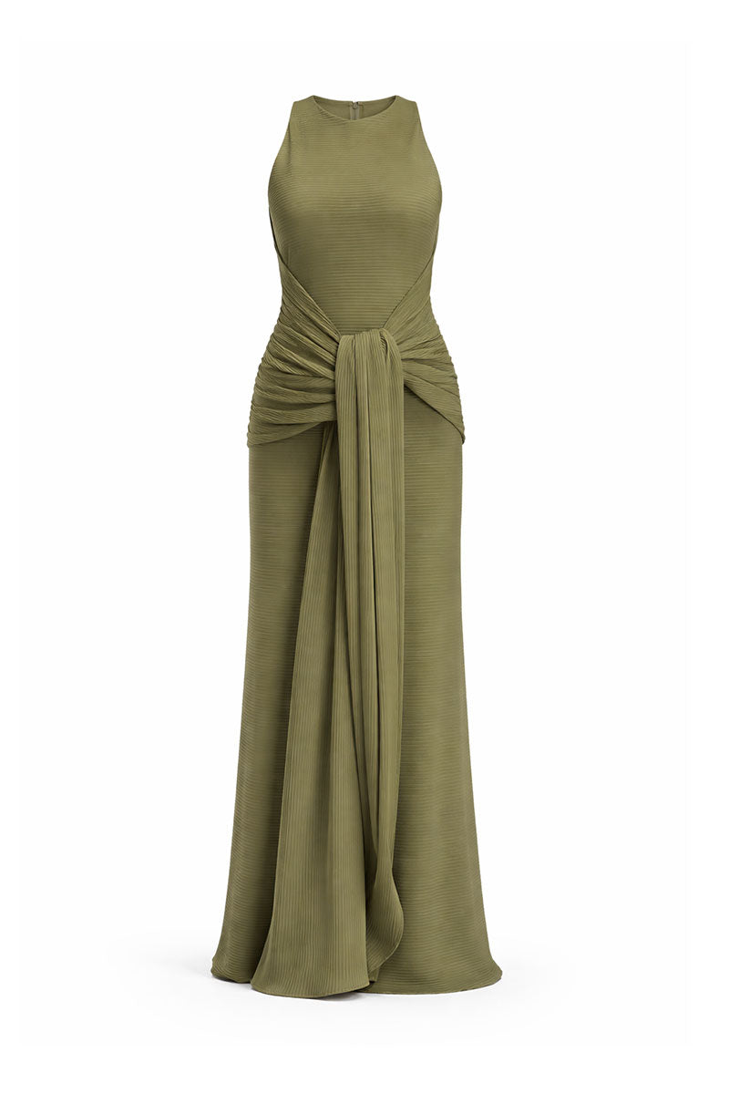 Forest green Maylé Vásquez Consta maxi dress displayed on a hanger, showcasing its flowing fabric and elegant design.