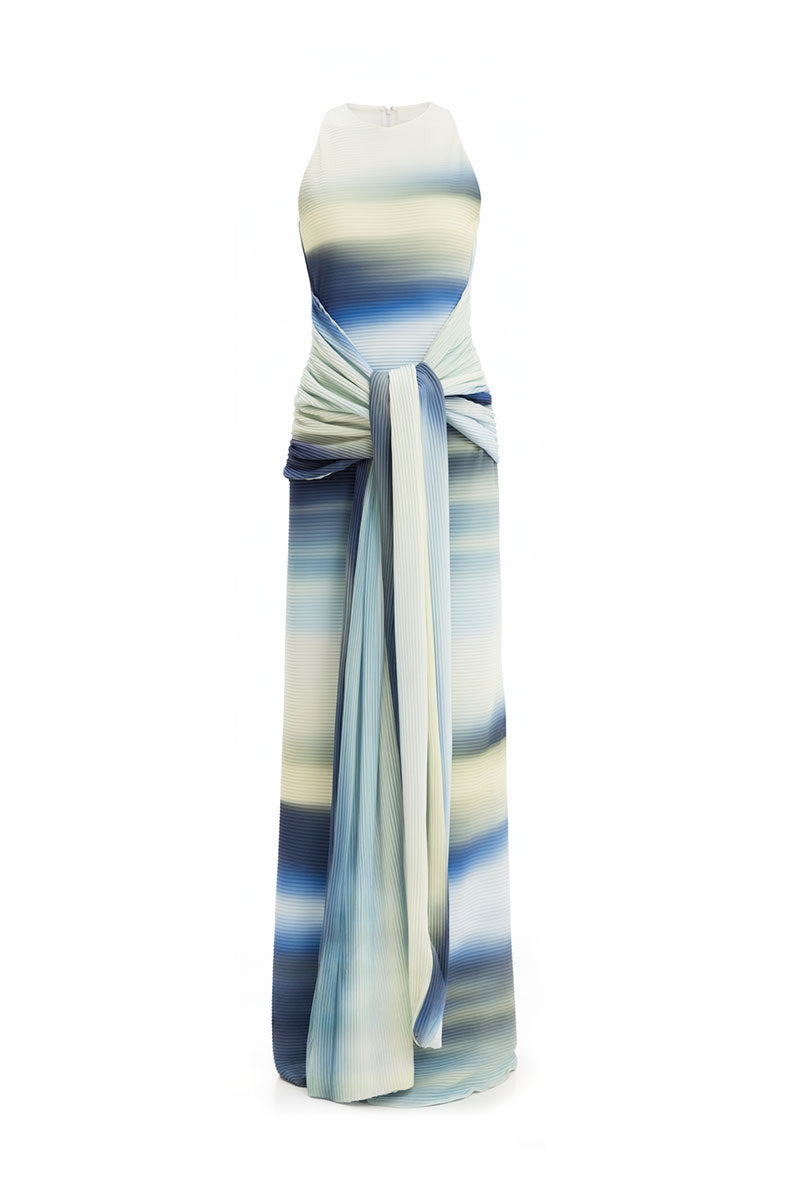 Maylé Vásquez Consta Maxi Dress with waves print, flowing fabric, and elegant design perfect for summer or formal occasions.