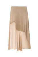 Nude IKINITA Nausica midi skirt displayed on a hanger, showcasing its elegant design and soft fabric.
