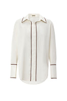 White boyfriend shirt by IKINITA, featuring a classic button-up design, displayed flat on a neutral background.