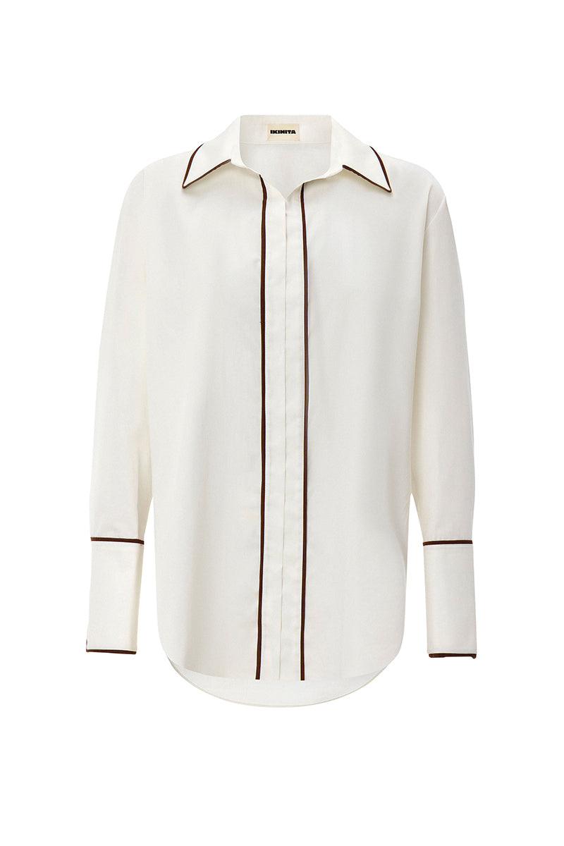 White boyfriend shirt by IKINITA, featuring a classic button-up design, displayed flat on a neutral background.