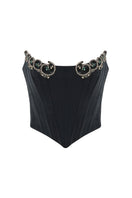 Black IKINITA Wave Corset top featuring structured design and adjustable straps, styled for a trendy, fitted look.