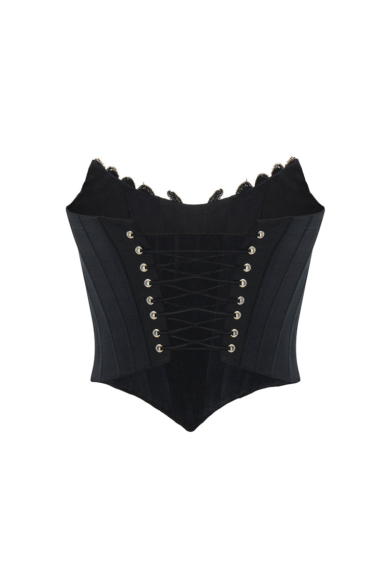 Black IKINITA WAVE Corset top featuring a fitted design and stylish wave pattern, perfect for trendy fashion looks.