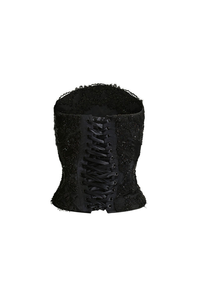 Black Lauren corset top by Scarlett Gasque featuring fitted design and lace-up details, shown on a mannequin.