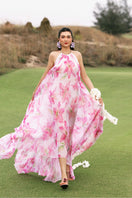 Multicolor halter neck pleated maxi dress by Valenciani, flowing fabric with a stylish silhouette and vibrant pattern.
