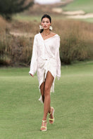 White silk shirt by Valenciani, shown with a smooth, elegant fabric and classic collar, perfect for sophisticated style.