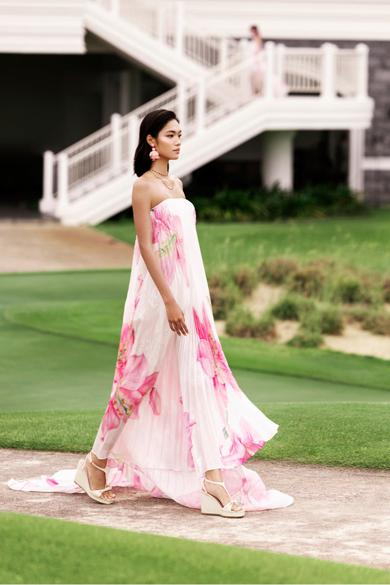 Valenciani CULT MIA X VALENCIANI The Blossom pleated gown, a stylish maxi dress with flowing fabric and intricate pleats.