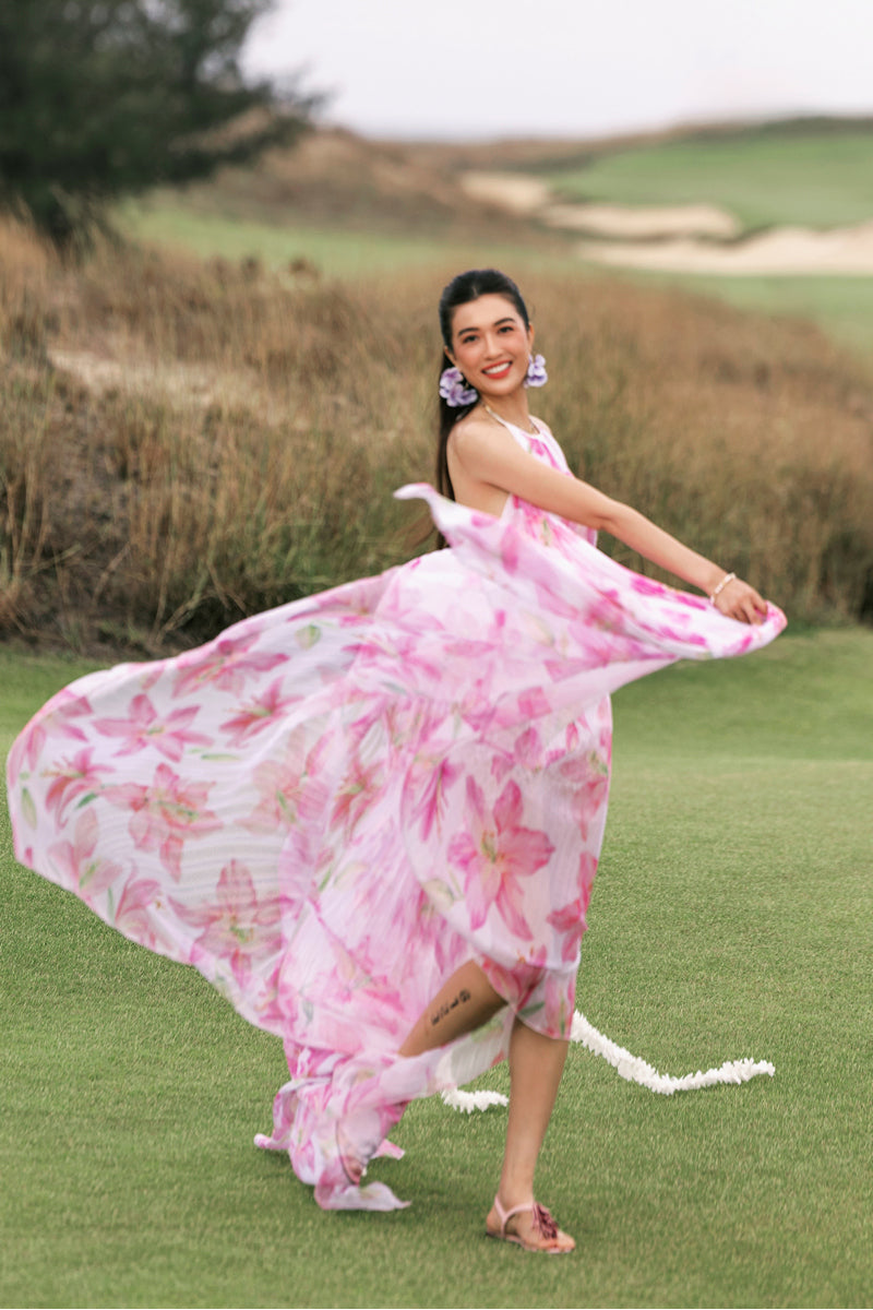 Valenciani halter neck pleated maxi dress in multicolor, flowing fabric with a stylish halter neckline and elegant design.